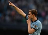 Manchester City's Edin Dzeko celebrates after scoring in Manchester on May 7, 2013